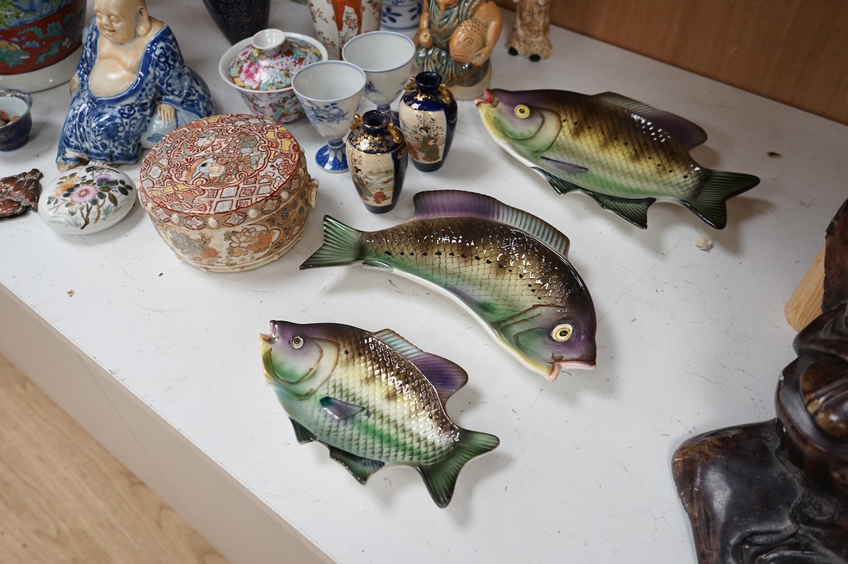 A collection of mostly Chinese and Japanese ceramics to include famille rose, satsuma, kutani etc. tallest 45cm